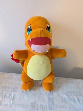 Pokémon Flame Action Charmander 12” Interactive Plush with Lights & Sounds WCT